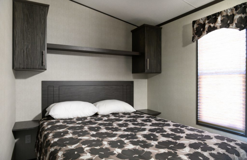 Cottage bedroom at Great Blue Resorts- Cherry Beach Resort.