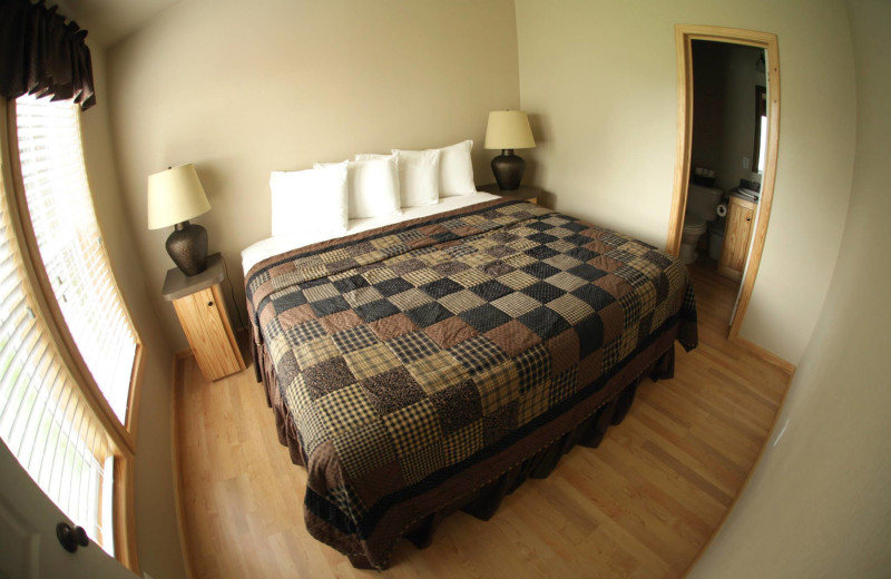 Cottage bedroom at Hill Country RV Resort & Cottage Rentals.