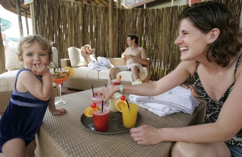 Family in cabana at Kalahari Waterpark Resort Convention Center.