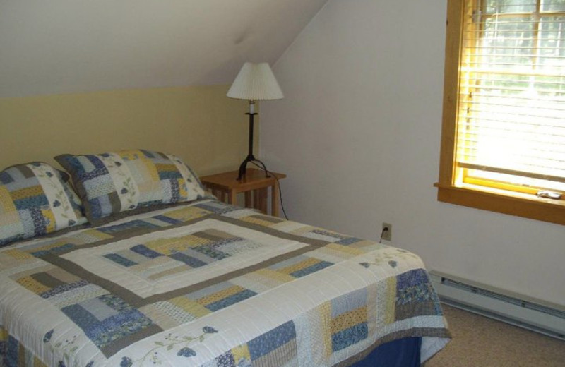 Cabin bedroom at Timberline Meadows Lodges.