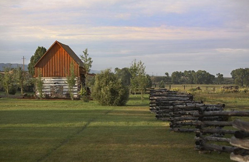 Log cabin exterior at Cottonwood Meadow Lodge.