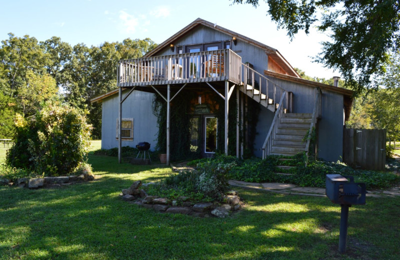 Cabin exterior at Mulberry Mountain Lodging & Events.