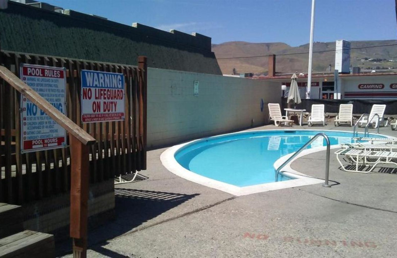 Outdoor pool at Cedars Inn and Suites.