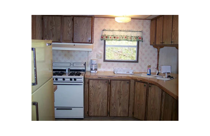 Cabin kitchen at Hocking Hills Cozy Cabins.