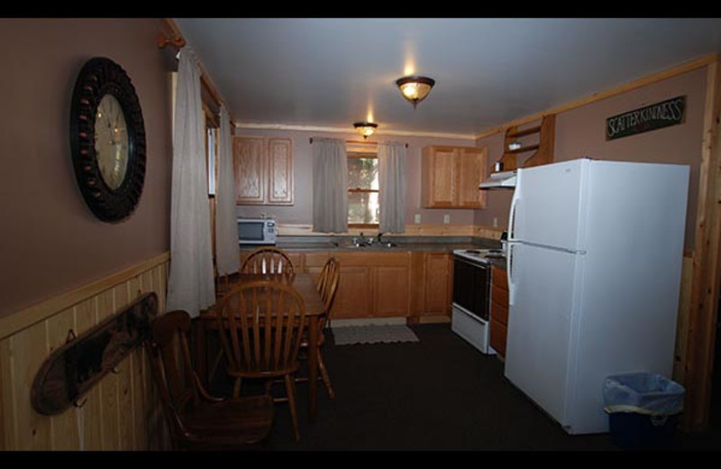 Cabin kitchen at Isle O' Dreams Lodge.