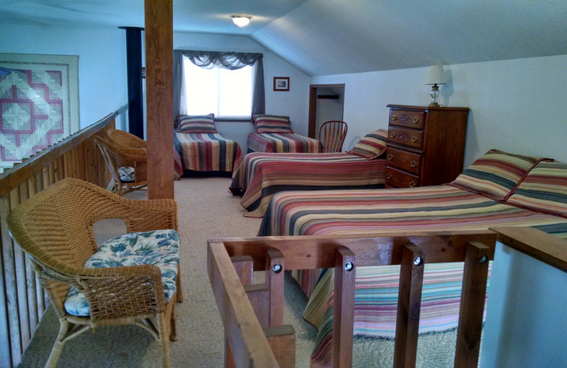 Cabin bedroom at The Arrows.