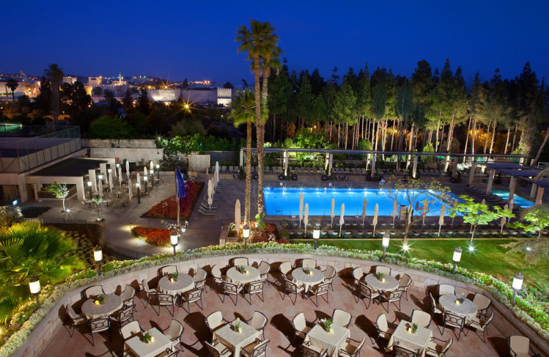 Outdoor pool and patio at King David Hotel.