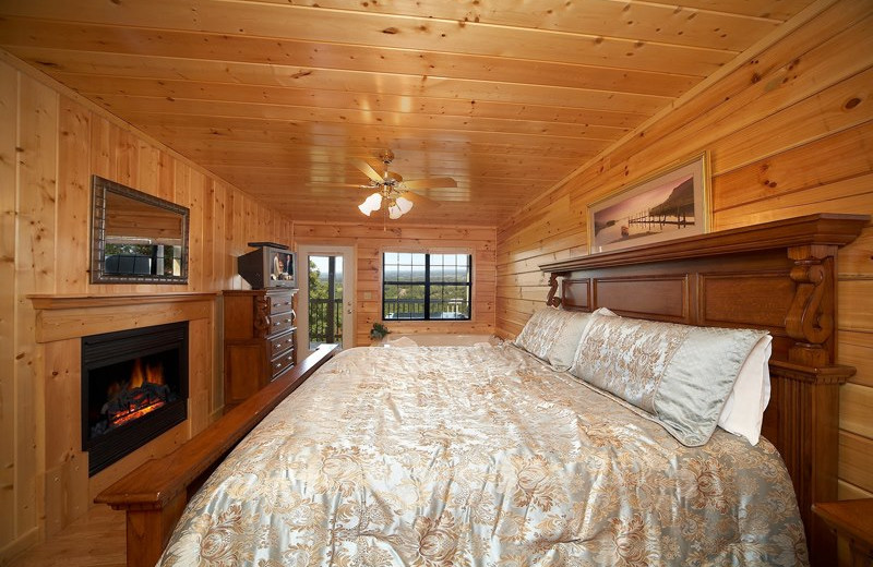 Cabin bedroom at Cabin Fever Vacations.