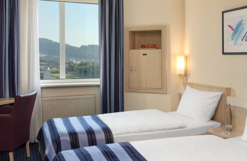 Guest room at InterCityHotel Freiburg.