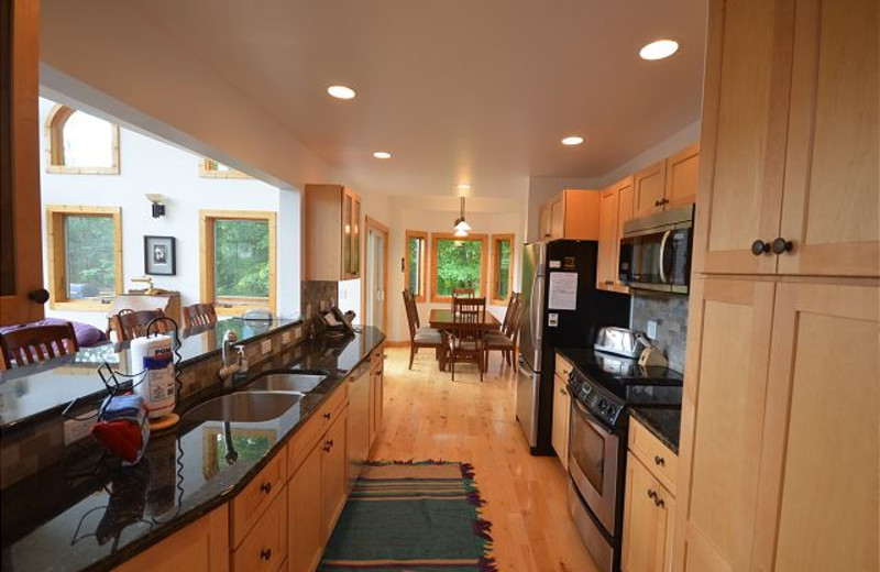 Rental kitchen at Visit Up North Vacation Rentals.