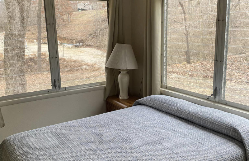 Cabin bedroom at Rock Harbor Resort.