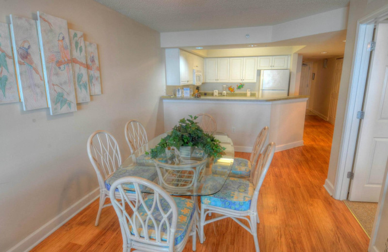 Rental kitchen at CondoLux Vacation Rentals.