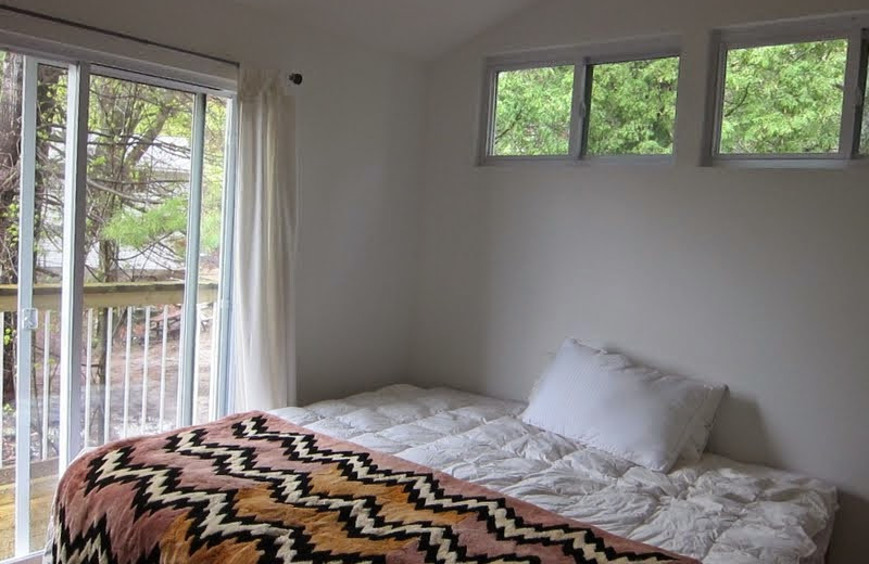 Cottage bedroom at Bob's Lake Cottages.