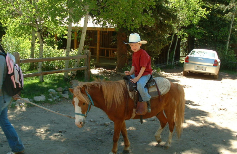 Horseback riding at Tumbling River Ranch.