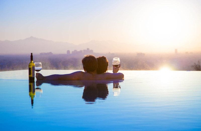 Couple in pool at HolidayRental.com.