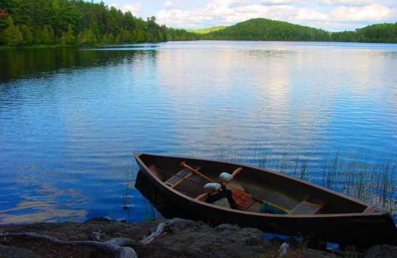 Canoe on shore at Golden Eagle Lodge.