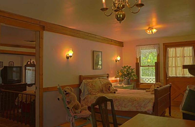 Cottage bedroom at Eleven Gables Inn on the Lake.