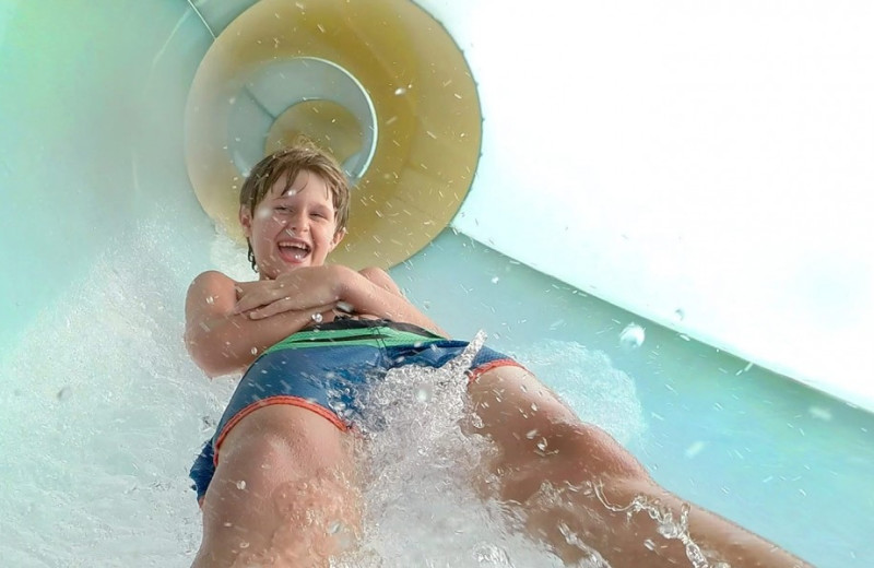 Going down the water slide at Crown Reef Resort.