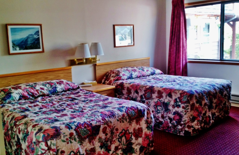 Guest bedroom at East Glacier Motel & Cabins.