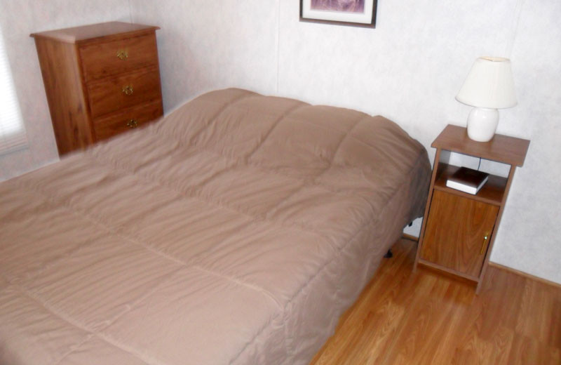 Cottage bedroom at King Creek Resort & Marina.