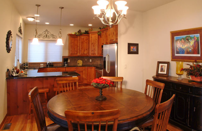 Vacation rental dining and kitchen at Marys Lake Vacation Condos.