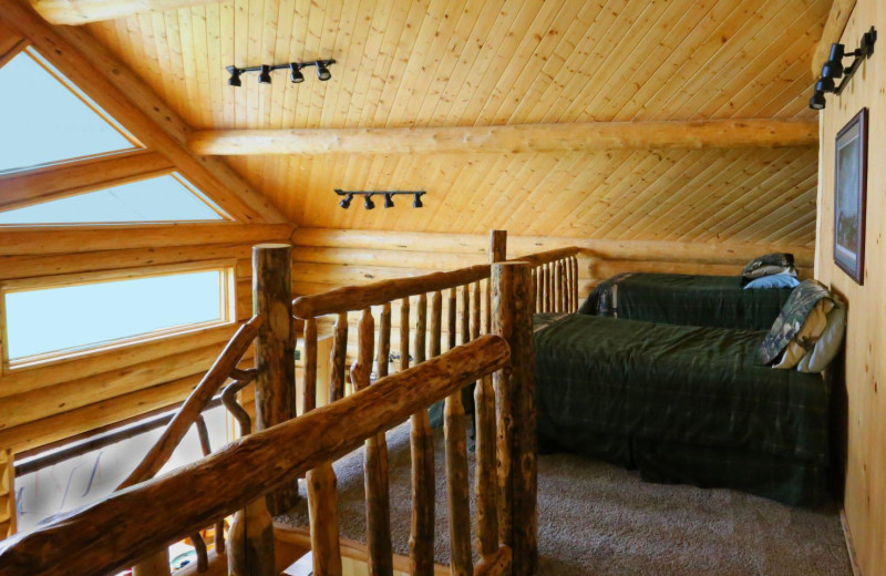 Cabin bedroom at Bear Paw Adventure.