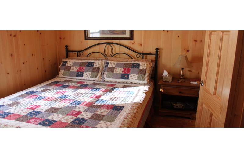 Cabin bedroom at Hocking Hills Backwoods Retreat.