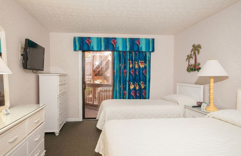 Guest room at Caribbean Resort & Villas.