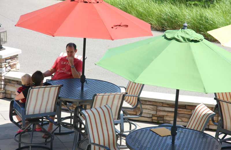 Family on patio at The Beach House.