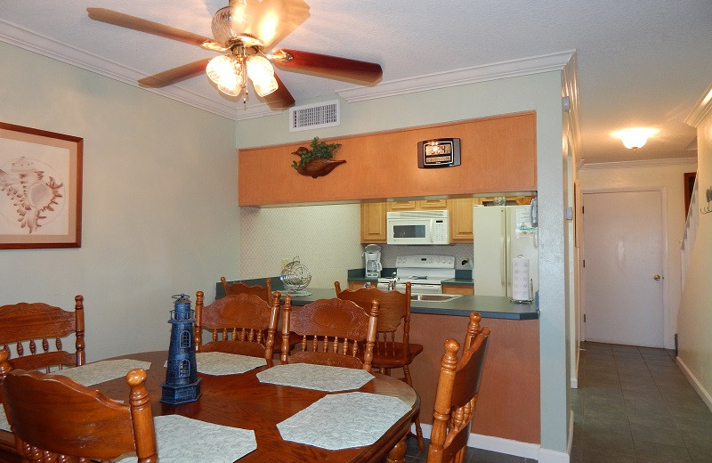 Rental kitchen at Family Sun Vacation Rentals.