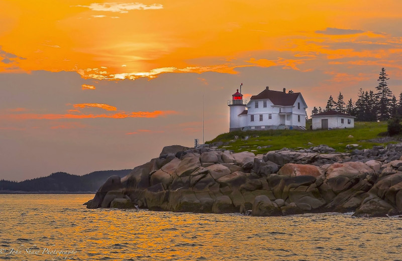 Light house sunset near Mount Battie Motel.