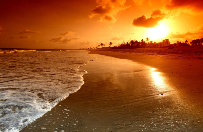 Beach sunset at Barefoot Resort Rentals.