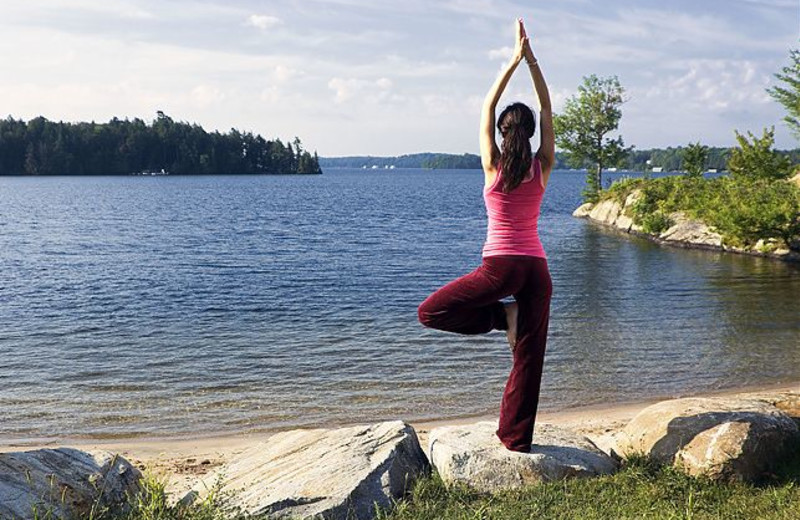 Yoga by the lake at JW Marriott The Rosseau Muskoka Resort & Spa.