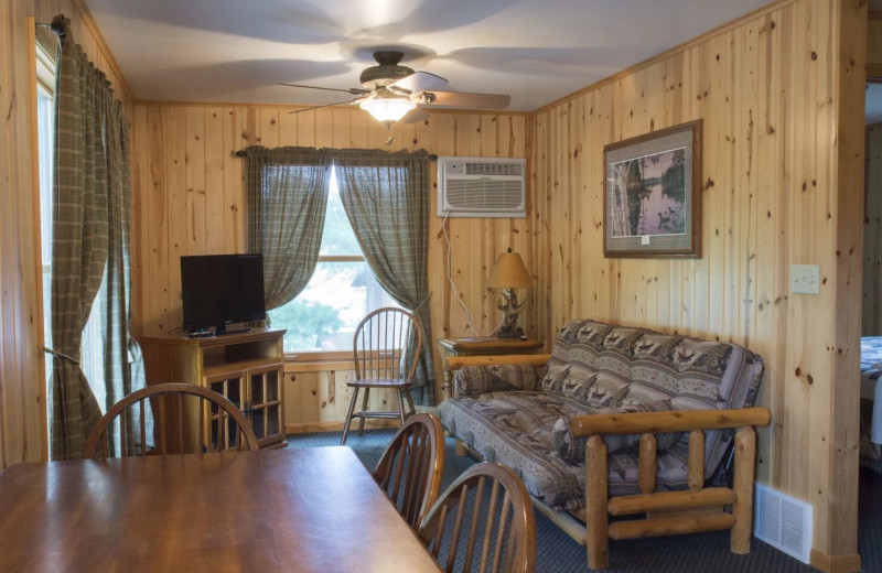 Cabin living room at Riverside Point Resort Motel.