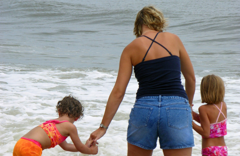 Family at the beach at Monterey Resort.