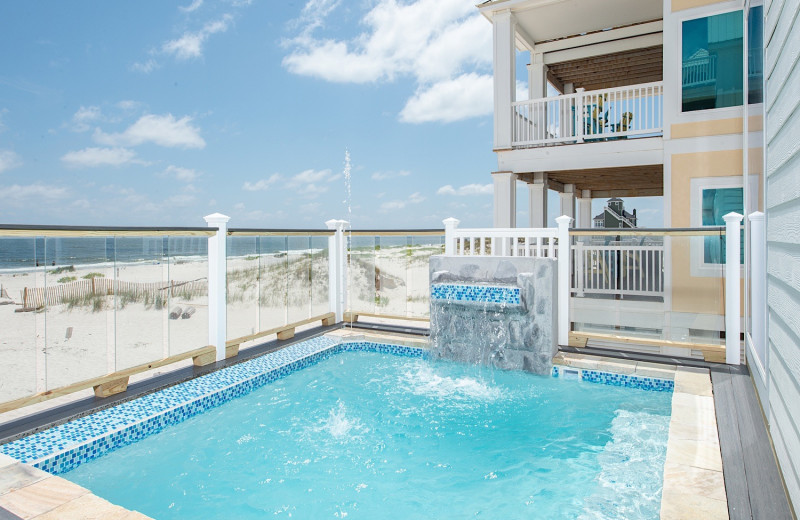 Rental outdoor pool at Sunset Properties.