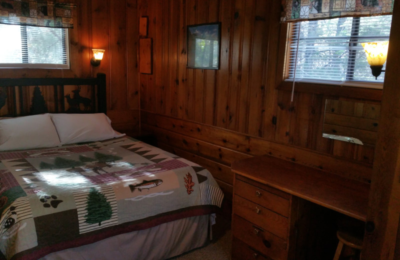 Cabin bedroom at Hidden Rest Resort.