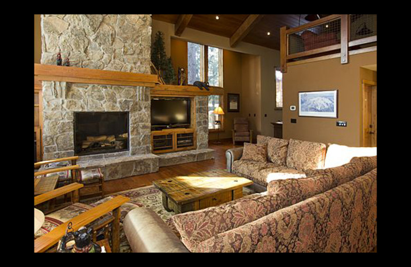 Vacation rental living room with fireplace at Mammoth Property Reservations.