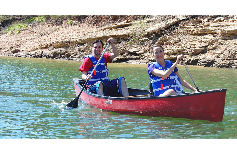 Canoeing at Beaver Lakefront Cabins.