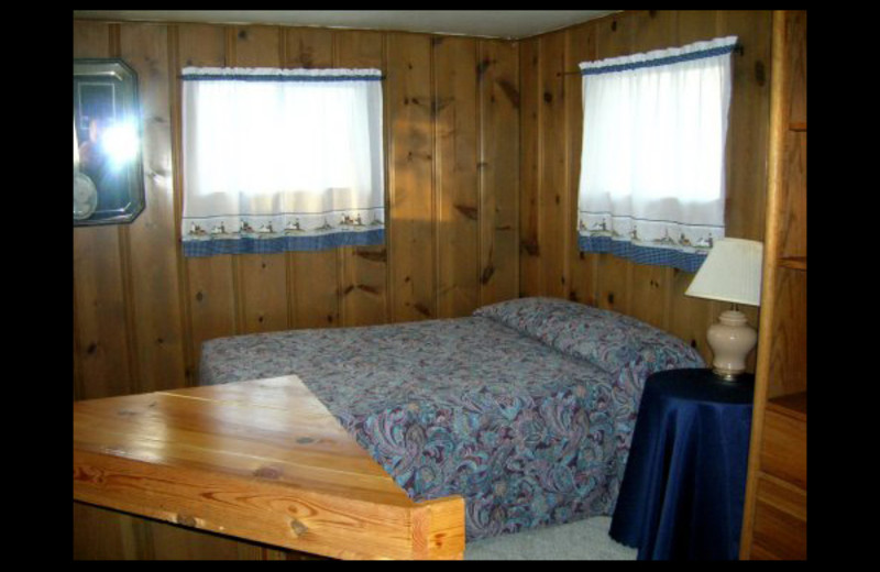 Cabin bedroom at Lighthouse Lodge Resort.