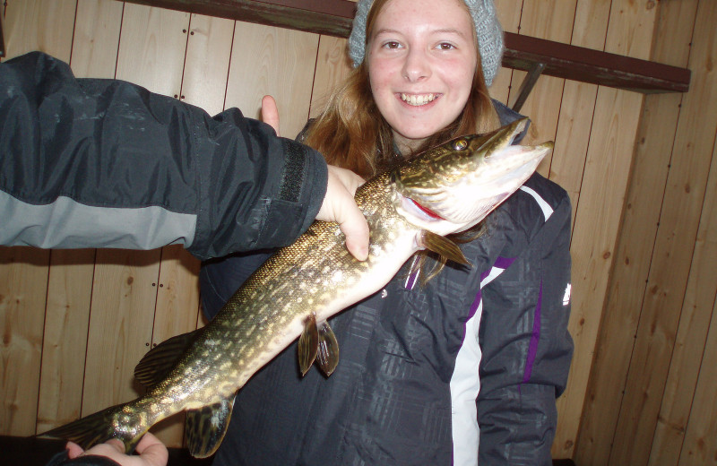 Ice fishing at Woodland Beach Resort.