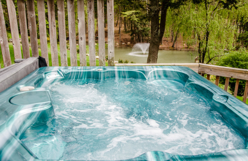 Cabin hot tub at Asheville Cabins of Willow Winds.