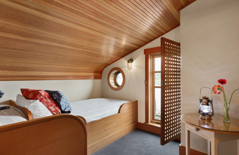 This is the side room to the Captains Suite including two twin beds and a view of the channel. 