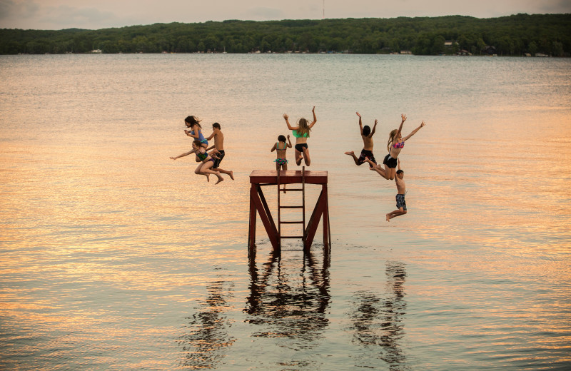 Jumping in lake at Fair Hills Resort.