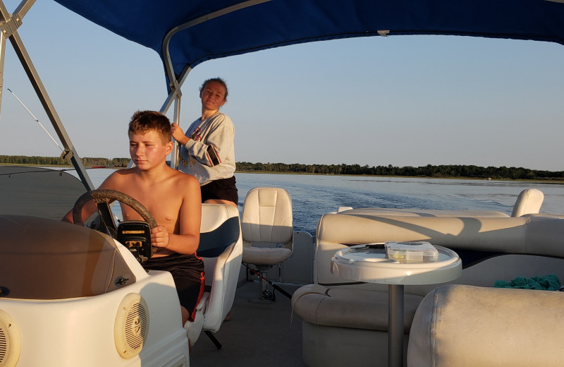 Boating at Cozy Bay Resort.