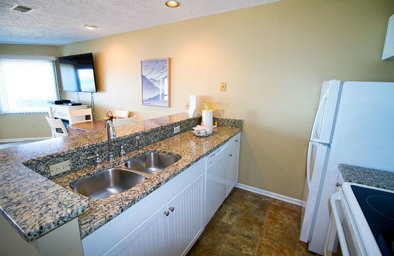 Condo kitchen at The Beach Condominiums Hotel-Resort.