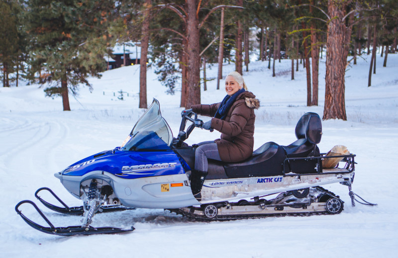 Snowmobiling at The Resort at Paws Up.