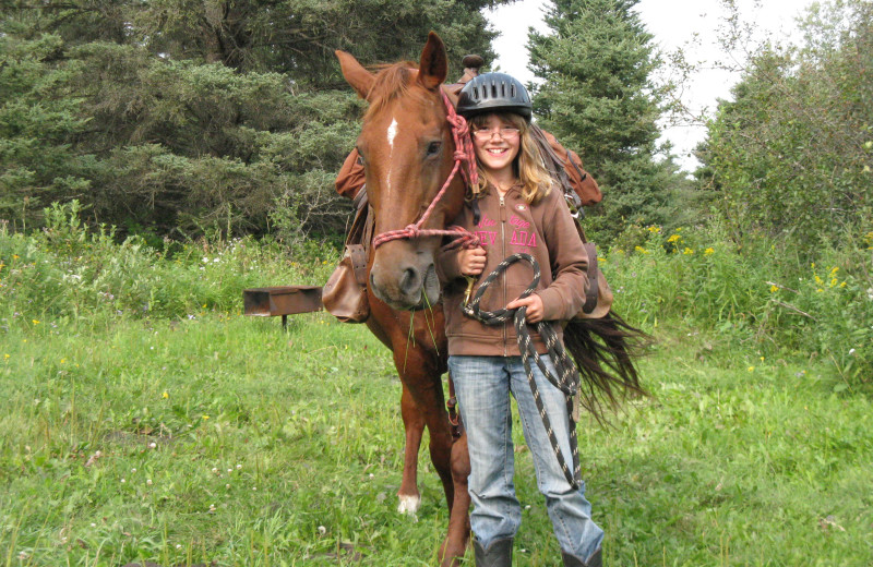 Kid and horse at Trailhead Ranch.