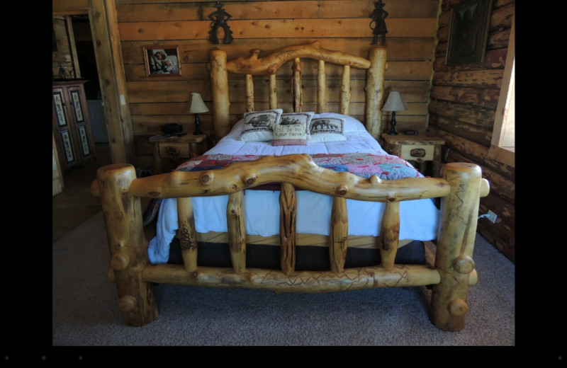Cabin bedroom at Canyonlands Lodging.
