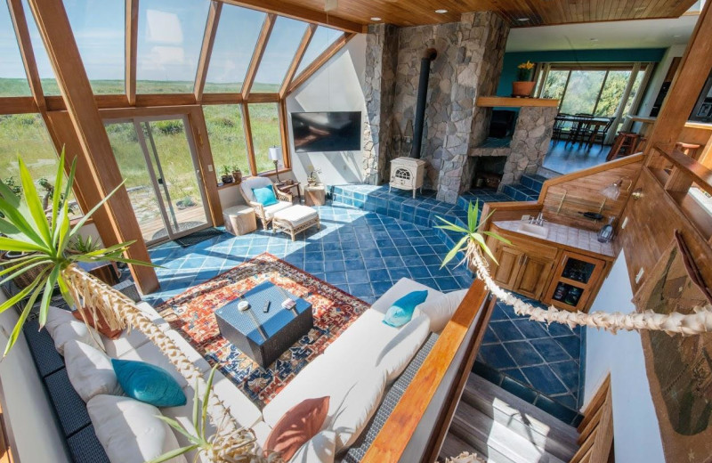 Rental living room at Beachhouse Vacation Rentals.